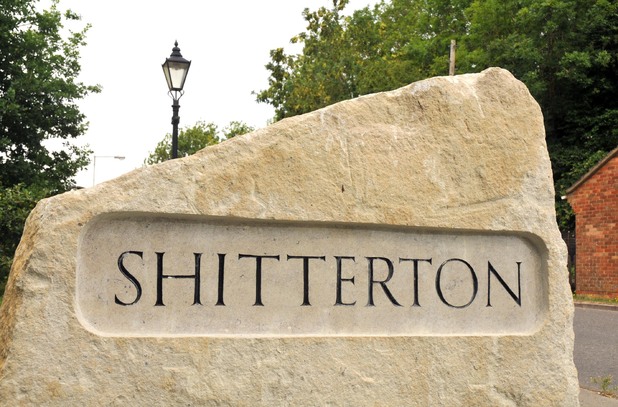 Shitterton stone road sign