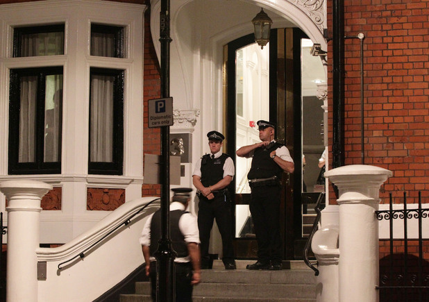 Police outside the Ecuadorian embassy on August 15, 2012. Julian Assange is thought to be staying here, as he seeks political asylum in Ecuador.