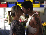 Bianca and Heath share a kiss.