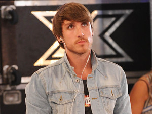 Kye waits to go on stage.