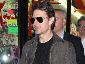 Tom Cruise leaves Chinawhite nightclub via a shop in busy Oxford Street after watching son Connor Cruise Djing.