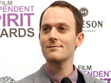 Will Reiser poses with the best first screenplay award for 50/50 at the Independent - showbiz_will_reiser_1