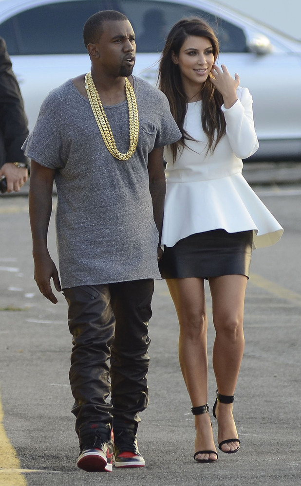 Kim Kardashian and Kanye West on their way to the Heliport in Manhattan.