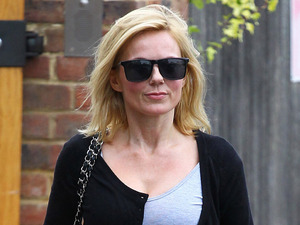Geri Halliwell
leaving home wearing a pink skirt and sunglasses
London, England
