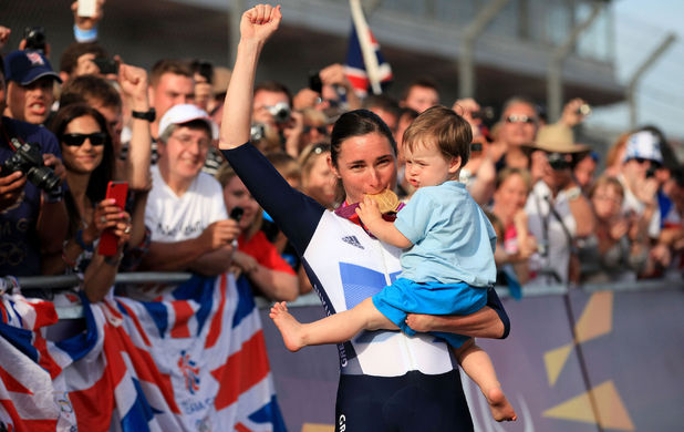 Great Britain's Sarah Storey shows her 2 year old nephew Gethin Crayford her gold medal after winning the Women's Individual C 4-5 Road Race