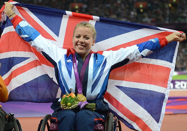 Great Britain's Hannah Cockroft celebrates with her Gold medal after winning the Women's 200m - T34