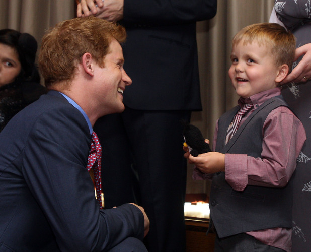 Prince Harry talks to Alex Logan as he attends the WellChild awards ceremony InterContinental Park Lane Hotel, London.
Picture date: Monday September 3, 2012. Alex, aged six, was interviewed by ITV News with his mother Debbie Logan ahead of the prize-giving event, and when asked what he would say to the royal replied: "I'm glad you've got your clothes on Prince Harry". See PA story ROYAL Harry. Photo credit should read: Lewis Whyld/PA Wire