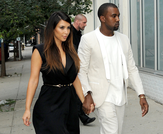 Kim Kardashian and Kanye West
holding hands as they arrive at a store in Soho to go shopping
New York City