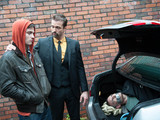 Joel sees Mick tied and gagged in the boot.
