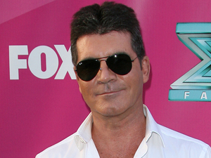 Simon Cowell at The X Factor USA Season 2 premiere screening and handprint ceremony at Grauman's Chinese Theater, Los Angeles