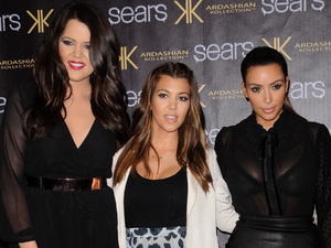 Kim Kardashian, Kourtney Kardashian and Khloe Kardashian celebrate the one year anniversary of the Kardashian Kollection.