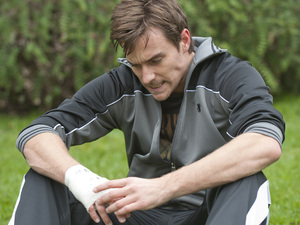 The pain in his hand is too much for Rhys to handle.