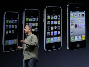 iPhone 5 launch event: Phil Schiller, Apple's senior vice president of worldwide marketing, speaks on stage during an introduction of the new iPhone 5 at an Apple event in San Francisco