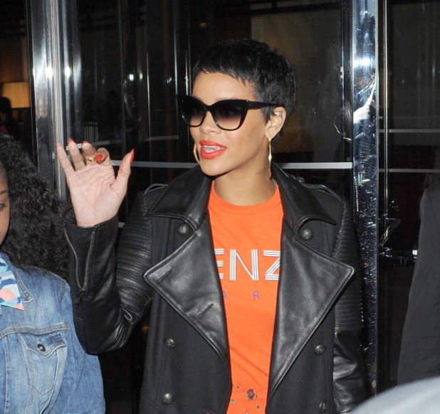 Rihanna in London wearing 'Hitman' clothing