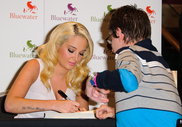 Tulisa Contostavlos signs copies of her autobiography 'Honest - My story so far' at WHSmith's, Bluewater shopping centre Kent, England - 26.09.12