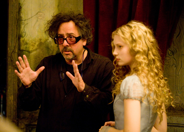 Tim Burton and Mia Wasikowska on set 