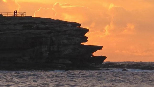 Photog Accidentally Captures Proposal While Snapping Pictures of a Sunrise