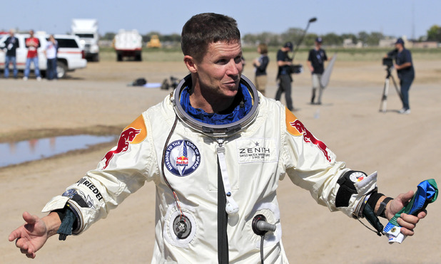 Felix Baumgartner talks to the media after his successful skydive from 24 miles (39km) above Earth - New Mexico, October 14, 2012
