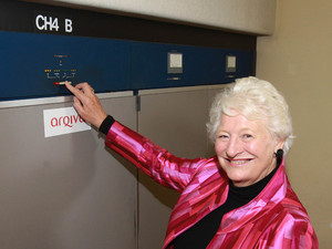 Dame Mary Peters hits the button to switch off Channel 4's analogue television channels across Northern Ireland at the Divis Transmitting Station in Belfast. 
