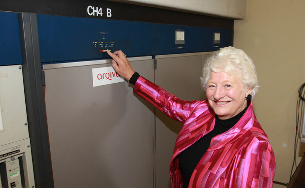 Dame Mary Peters hits the button to switch off Channel 4's analogue television channels across Northern Ireland at the Divis Transmitting Station in Belfast.