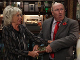 7989: Gloria fights desperately for the award as news reaches the editor that she wrote her own customer comment cards to cheat