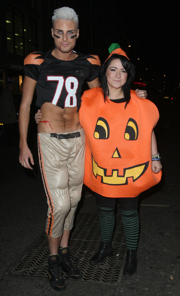 X Factor finalists Rylan Clark and Lucy Spraggon Leaving Mahiki Club after celebrating Rylan's birthday. The flamboyant model wore a Halloween style American football costume
for the bash.