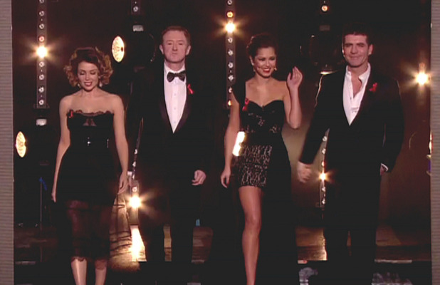 Louis Walsh, Dannii Minogue, Cheryl Cole and Simon Cowell are judges on 'The X Factor', shown on ITVEngland - 05.12.10
Supplied by WENN.comWENN does not claim any ownership including but not limited to Copyright or License in the attached material. Any downloading fees charged by WENN are for WENN's services only, and do not, nor are they intended to, convey to the user any ownership of Copyright or License in the material. By publishing this material you expressly agree to indemnify and to hold WENN and its directors, shareholders and employees harmless from any loss, claims, damages, demands, expenses (including legal fees), or any causes of action or allegation against WENN arising out of or connected in any way with publication of the material.