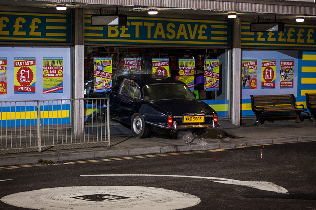 Joey and a drunk Lauren lose control of the car and they crash into a shop front.