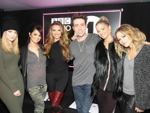 Miss Mode: Girls Aloud and Nick Grimshaw pose at Radio 1 studios