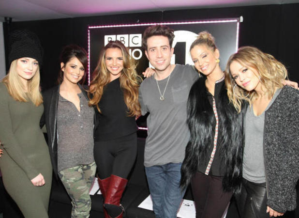 Miss Mode: Girls Aloud and Nick Grimshaw pose at Radio 1 studios