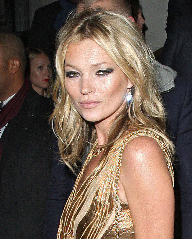Kate Moss in a gold dress,
at the after party celebrating the launch of 'Kate: The Kate Moss Book' hosted by Marc Jacobs, published by Rizzoli New York and supported by Ciroc Ultra Premium Vodka at 50 St. James.
London, England
