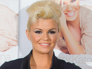 Kerry Katona at a photocall to launch her autobiography 'Still Standing' at the Century Club, in central London
