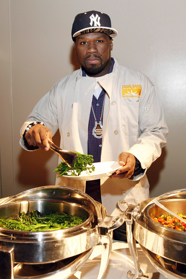 showbiz_50_cent_food_bank_serving.jpg