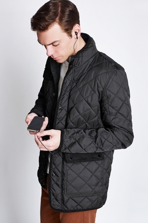 C.VOX jacket featuring built-in headphones, speakers and a control system