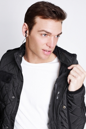 C.VOX jacket featuring built-in headphones, speakers and a control system