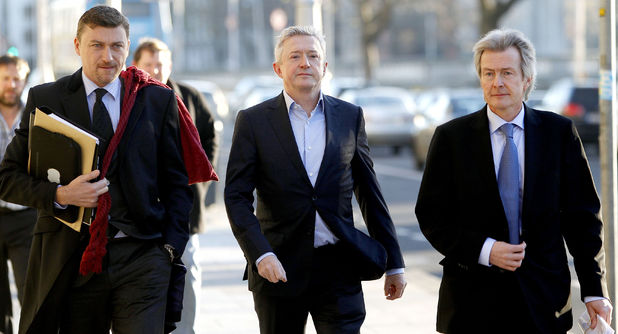 Louis Walsh on his way into court for his defamation case against Rupert Murdoch's News Group Newspapers (28/11/12)