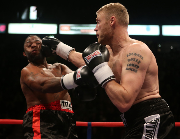Andrew Flintoff (right) and Richard Dawson in action during the International Heavyweight Contest at the Manchester Arena, Manchester.