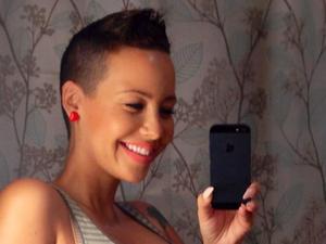 Amber Rose shows off her baby bump