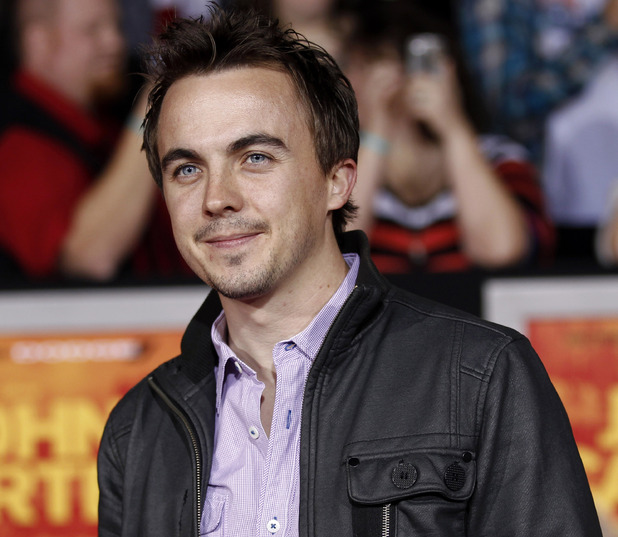 Frankie Muniz arrives at the premiere of "John Carter" in Los Angeles, Wednesday, Feb. 22, 2012.