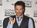 Peter Andre posing for press on the opening day of The Clothes Shows Live 2012