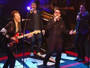 Bono, Chris Martin, Gary Barlow, Brandon Flowers perform at War Child gig in 2009.