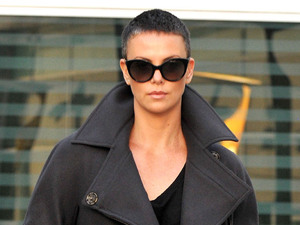 Actress Charlize Theron catches  a movie at Arclight Theater
Hollywood, California - 15.12.12