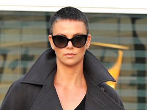 Actress Charlize Theron catches  a movie at Arclight Theater
Hollywood, California - 15.12.12