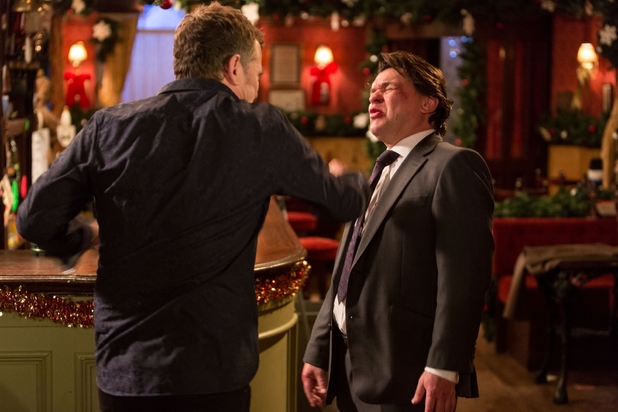 Alfie Moon punches Derek Branning