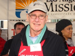 Harrison Ford helps with Los Angeles Mission Christmas Eve For The Homeless.