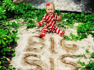 Jessica Simpson Twitter picture of daughter Maxwell with 'Big Sis' sand drawing