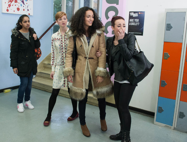 Sinead, Ruby and Phoebe watch as Esther walks away.