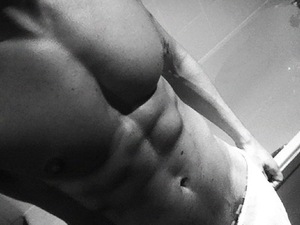 Mario Falcone tweets topless picture while in Mexico