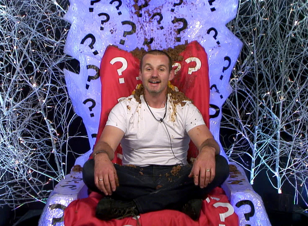 Ryan covered in dog food in the diary room for Day 8's task