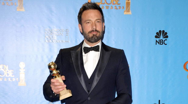 Ben Affleck poses with the award for for best motion picture (drama) for "Argo" backstage at the 70th Annual Golden Globe Awards